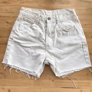 White high-waisted cutoff denim shorts